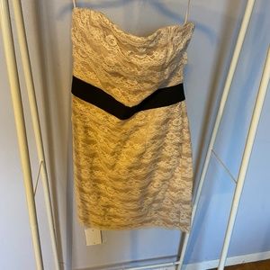 Cream coloured strapless lace dress